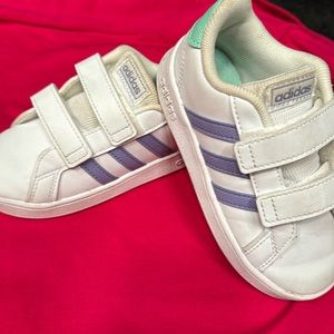 Children’s size 9 Adidas athletic or casual shoes.  Velcro closure.